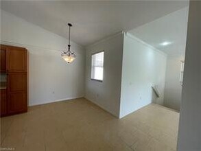 450 Robin Hood Cir-Unit -201 in Naples, FL - Building Photo - Building Photo