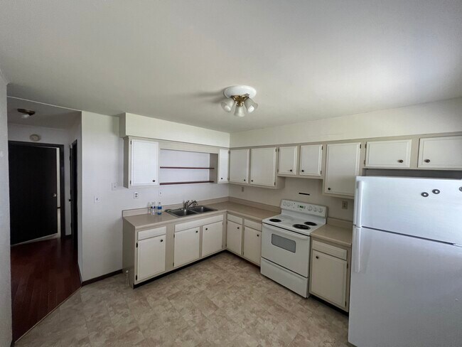 609 Denver St, Unit B in Lincoln, IL - Foto de edificio - Building Photo