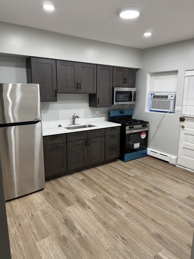 4404 N Melvina Ave in Chicago, IL - Building Photo - Building Photo
