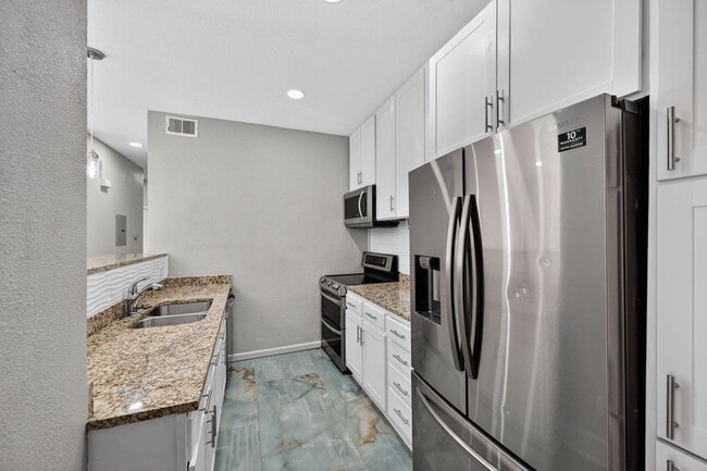 10784 W 63rd Pl in Arvada, CO - Building Photo - Building Photo