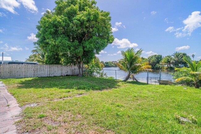 6390 Kimberly Blvd in North Lauderdale, FL - Building Photo - Building Photo