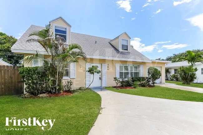584 Riverside Dr in Palm Beach Gardens, FL - Building Photo - Building Photo