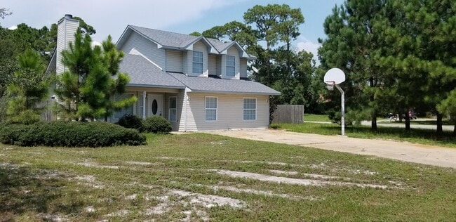 1077 Woodlore Cir in Gulf Breeze, FL - Building Photo - Building Photo