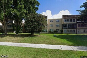 9301 Lime Bay Blvd in Tamarac, FL - Building Photo - Building Photo