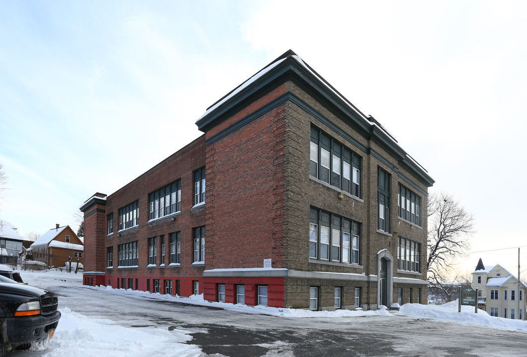 Academy Apartments in Amsterdam, NY - Building Photo