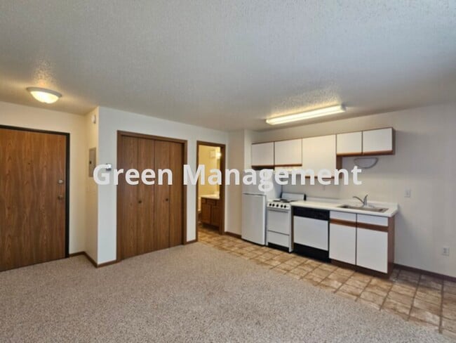 property at 1002-1002 43 1/2 St S