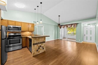 711 Lyons Rd in Coconut Creek, FL - Building Photo - Building Photo