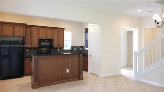 6033 NW 118th Dr in Coral Springs, FL - Building Photo