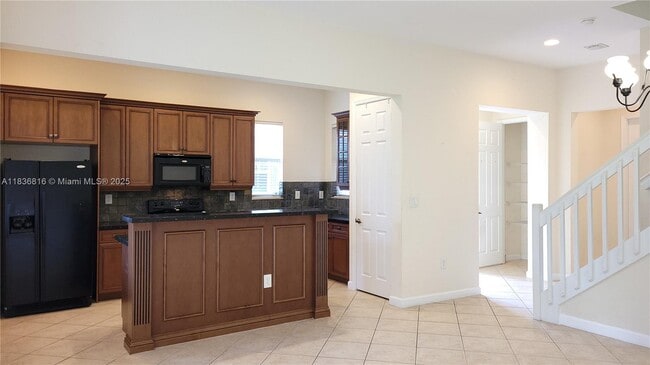 property at 6033 NW 118th Dr
