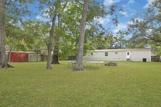 18565 Huckleberry Ln in Porter, TX - Building Photo - Building Photo