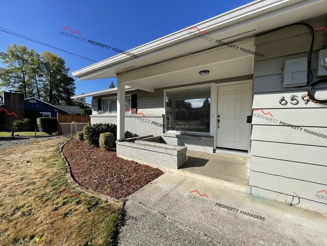 property at 659 NW New York Ave