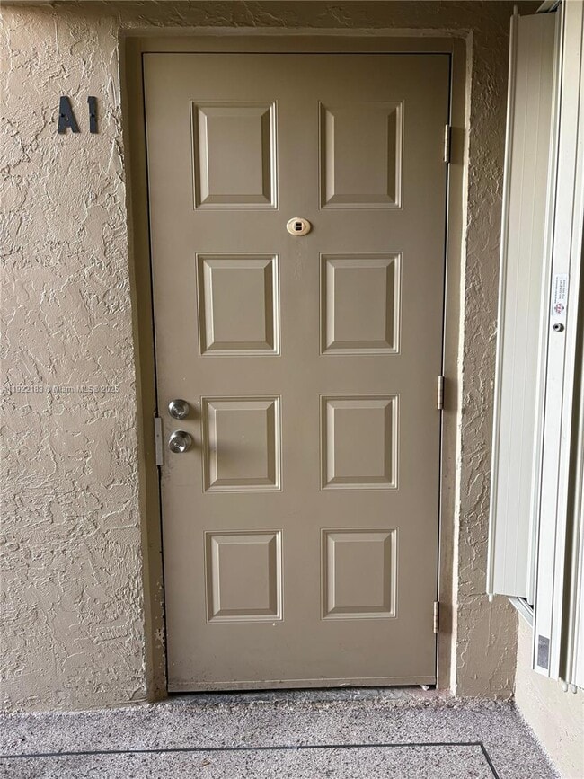 702 Sunny Pine Way in Greenacres, FL - Building Photo - Building Photo