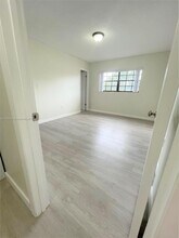 15969 NW 64th Ave, Unit 202 in Miami Lakes, FL - Building Photo - Building Photo