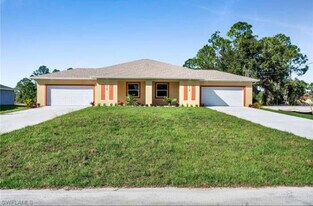 2118 Zaharihas Dr in Lehigh Acres, FL - Building Photo