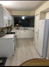 7505 Silver Trumpet Ln, Unit #102 in Naples, FL - Foto de edificio - Building Photo