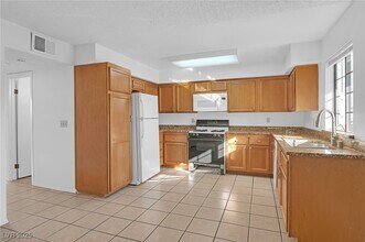 7030 Burcot Ave in Las Vegas, NV - Building Photo - Building Photo