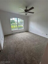 26992 Spanish Gardens Dr in Bonita Springs, FL - Building Photo - Building Photo