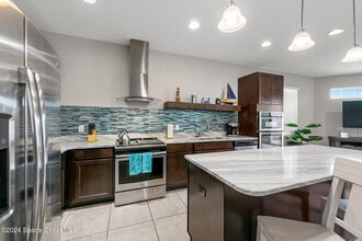 144 Mediterranean Way in Indian Harbour Beach, FL - Building Photo - Building Photo