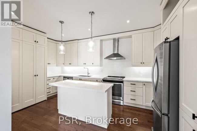 property at 114 Ossington Ave
