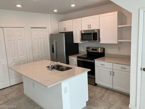 14093 Oviedo Pl in Tice, FL - Building Photo - Building Photo