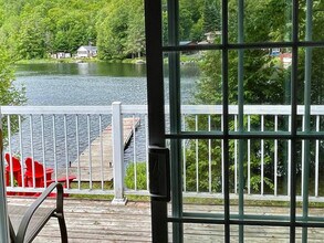 68 Chem. du Lac Achigan in Val-des-monts, QC - Building Photo - Building Photo