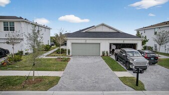 1446 Tangled Orch Trce in Loxahatchee, FL - Building Photo