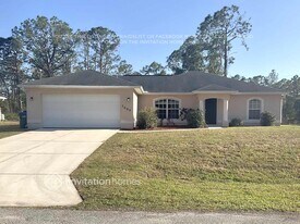 7699 Mclues Ave, Unit 1-208 in North Port, FL - Building Photo