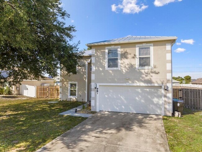 981 SW McElroy Ave in Port St. Lucie, FL - Building Photo - Building Photo