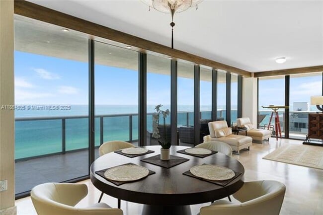 property at 5875 Collins Ave