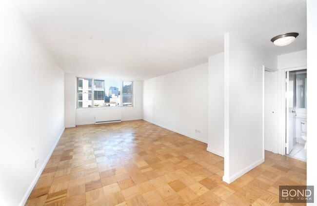 property at 166 E 34th St