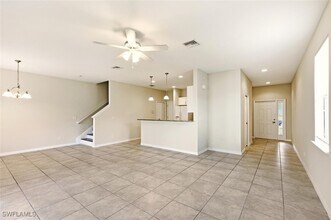 14825 Sutherland Ave in Naples, FL - Building Photo - Building Photo