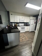 10131 W Sunrise Blvd, Unit 305 in Plantation, FL - Building Photo - Building Photo