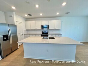 27851 Solis Grande Dr in Bonita Springs, FL - Building Photo - Building Photo