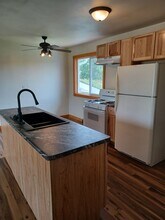 1202 Mosinee Ave-Unit -1/2 in Mosinee, WI - Foto de edificio - Building Photo