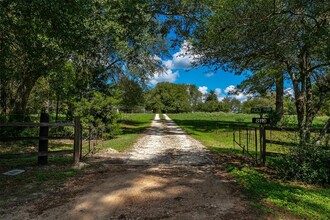 8119 CR 209 in Plantersville, TX - Building Photo - Building Photo