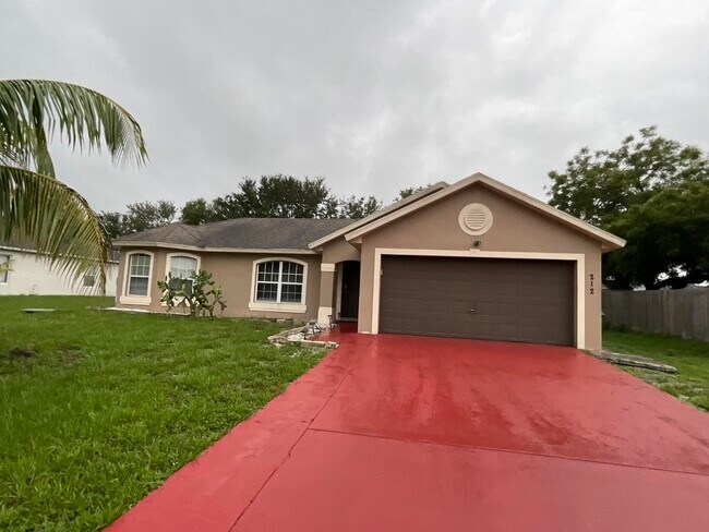 property at 212 SW Yager Pl