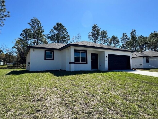 7185 N Tallwood Dr in Citrus Springs, FL - Building Photo - Building Photo