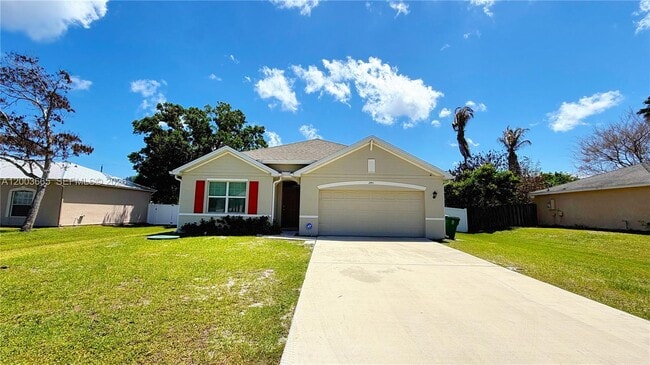 2402 SE Gillette Ave in Port St. Lucie, FL - Building Photo - Building Photo