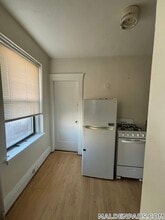 349 Pleasant St, Unit B1-15 in Malden, MA - Foto de edificio - Building Photo