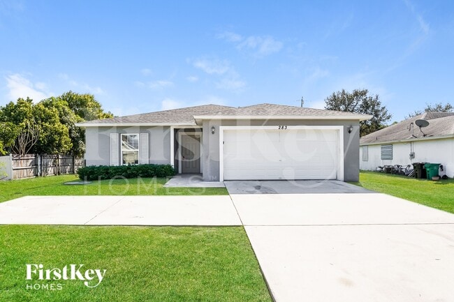 property at 283 SW Tulip Blvd