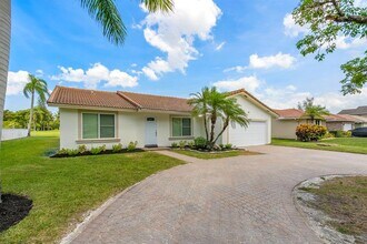 1911 NW 107th Dr in Coral Springs, FL - Building Photo - Building Photo