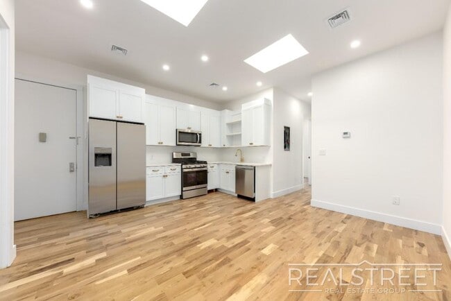 Brand New 4 Bed 3 Bath Floor Thru with WD & Central Air in Crown Heights!