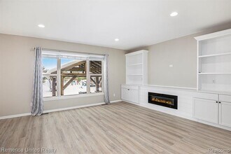 59696 Twin Pines Dr in New Hudson, MI - Building Photo - Building Photo