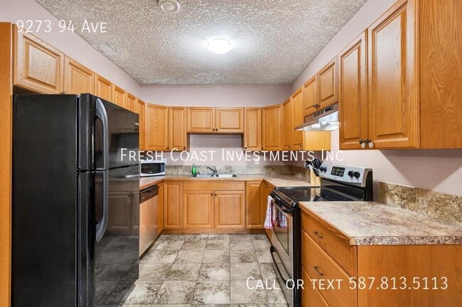 property at 9273-9294 94 Ave