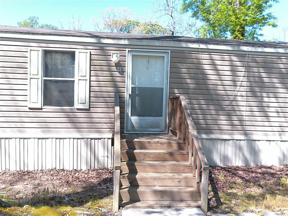 22 Chipmunk Trail in Shepherd, TX - Building Photo