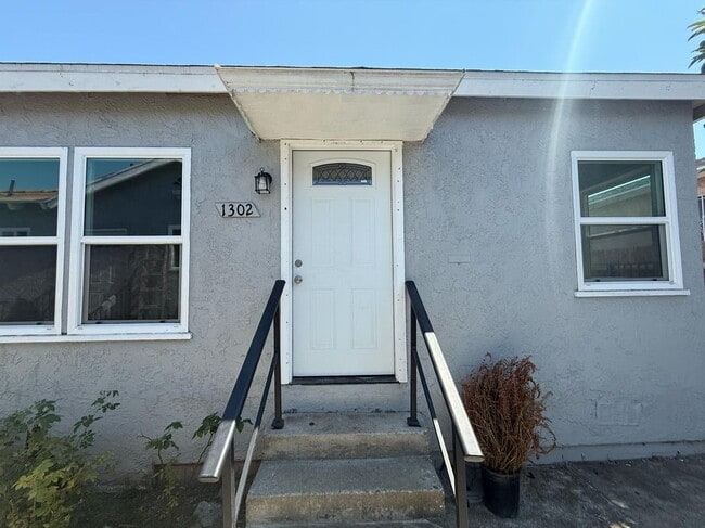 property at 1302 W 109th St