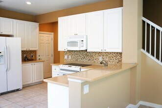 1056 Pinewood Lake Ct in Greenacres, FL - Building Photo - Building Photo