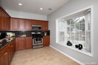 83 Fairfield Ln-Unit -83 in Mastic Beach, NY - Building Photo - Building Photo