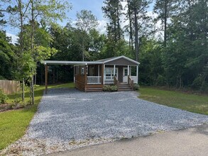 10731 Lilinoe Way in Diamondhead, MS - Foto de edificio - Building Photo