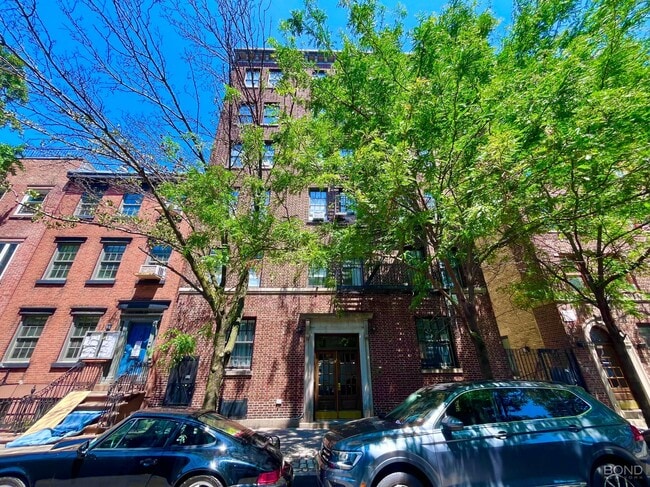 207-209-209 W 11th St